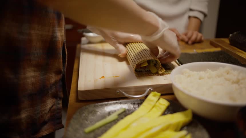 A person preparing a chinese food meal at home