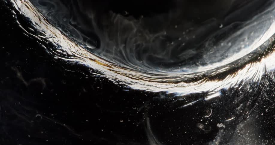 Bubble and liquid abstract design in slow motion spiral movement