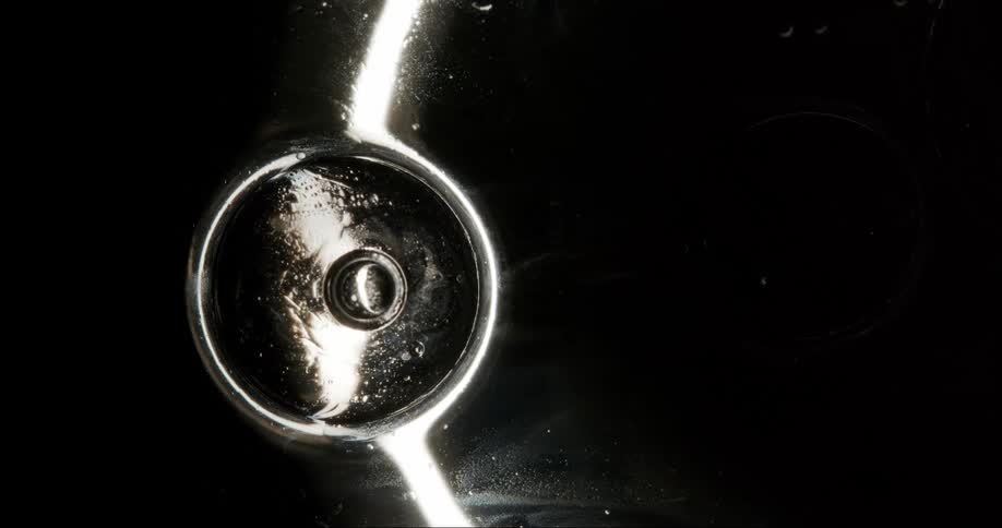 A large bubble absorbs a small one