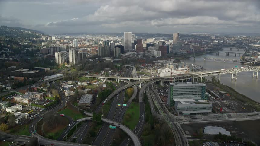 Skyline of the center of an urban city with a cloudy sky during the day