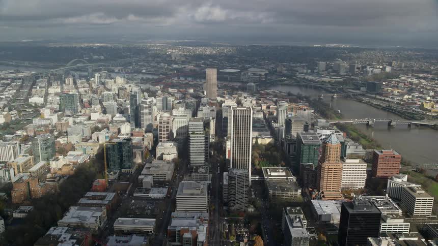 Skyline of an urban city with a dirty water river