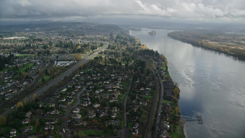 Aerial view of an urban city on the edge of a lake