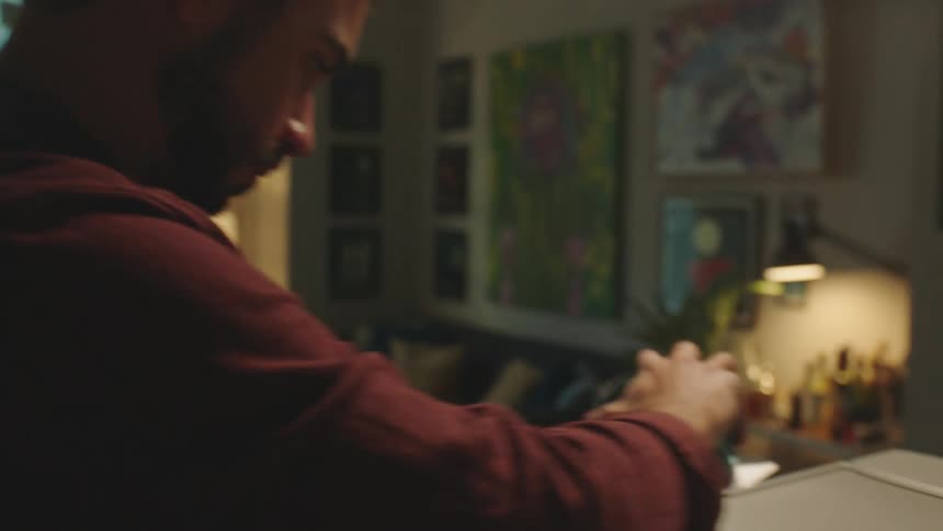 Portrait of a man using a coffee machine
