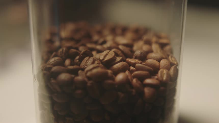 Closeup of coffee beans inside a cup