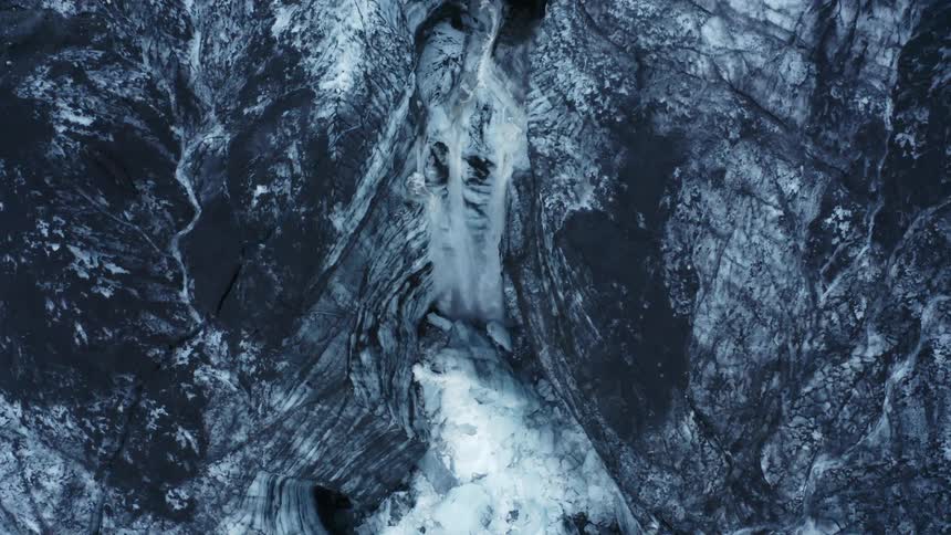 Waterfall coming out of a glacier