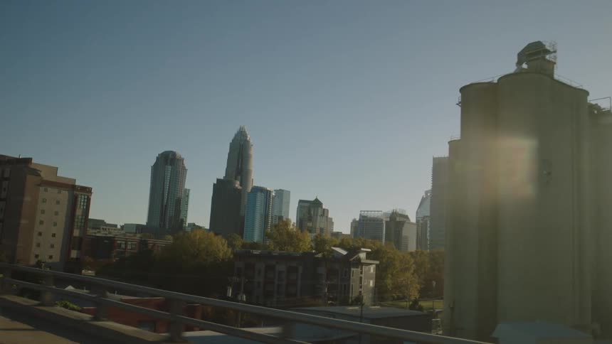 Panorama of skyscrapers houses and factories in the morning
