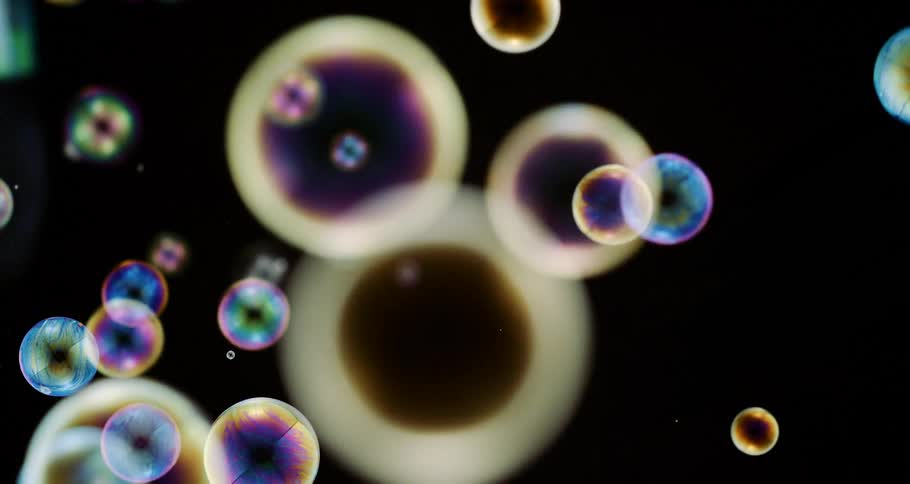 The rainbow colored bubbles fall