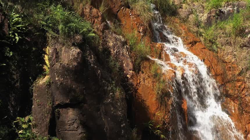View of a waterfall with water flowing in a natural environment