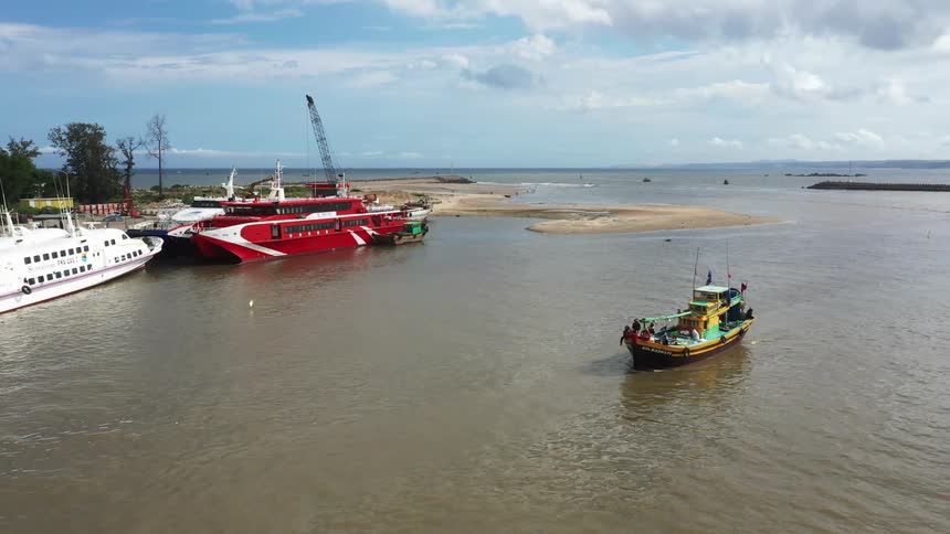 Boats along the shore of a beach