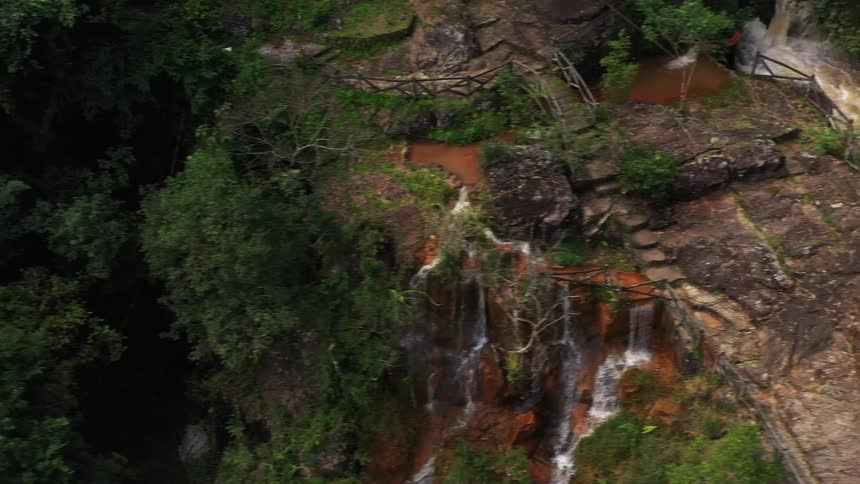 The waterfall heads downhill