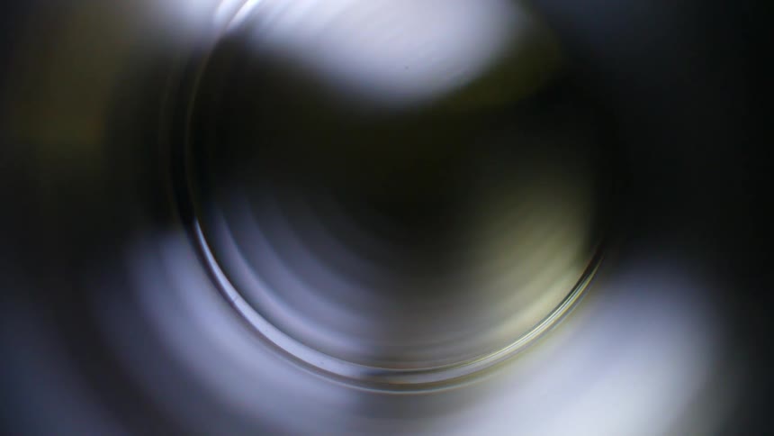 Extreme closeup of a rotating lens