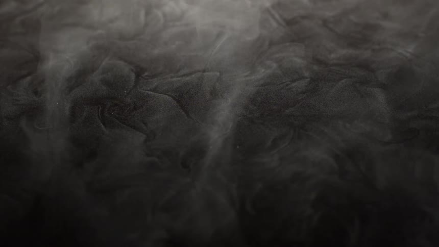 Smoke flowing over abstract ground