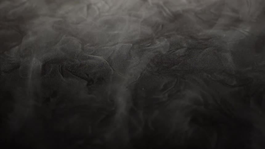 Smoke flowing over abstract ground