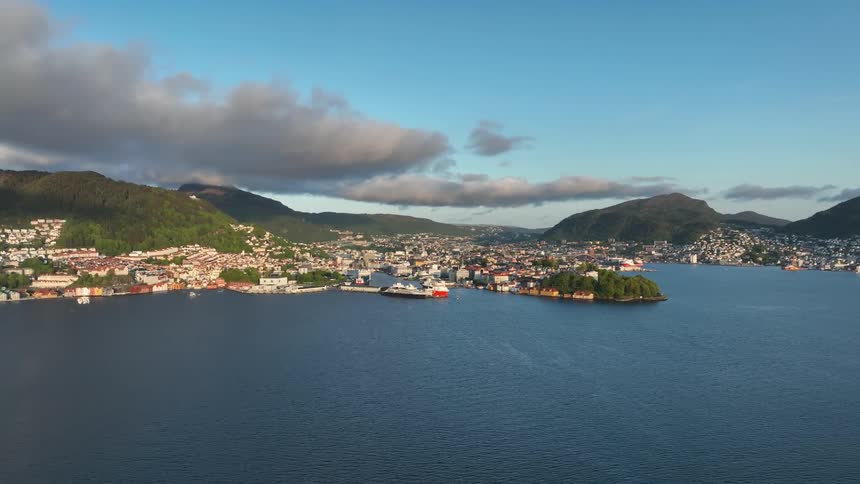 An aerial view of a coastal city and its harbor