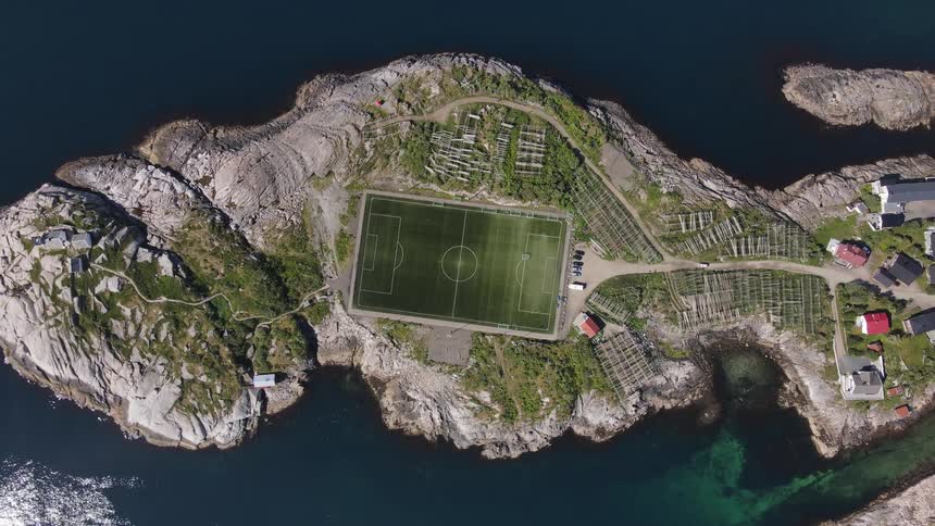 Aerial of a football field on a paradise island