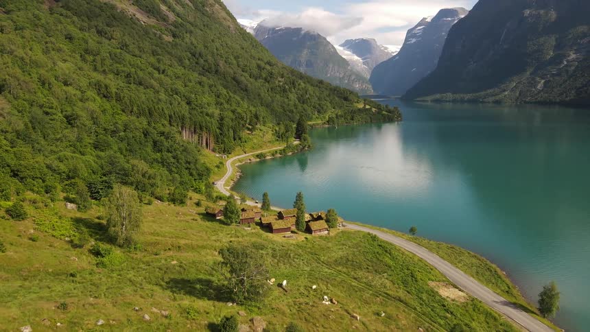 An aerial view of buildings on the coast of lovatnet lake