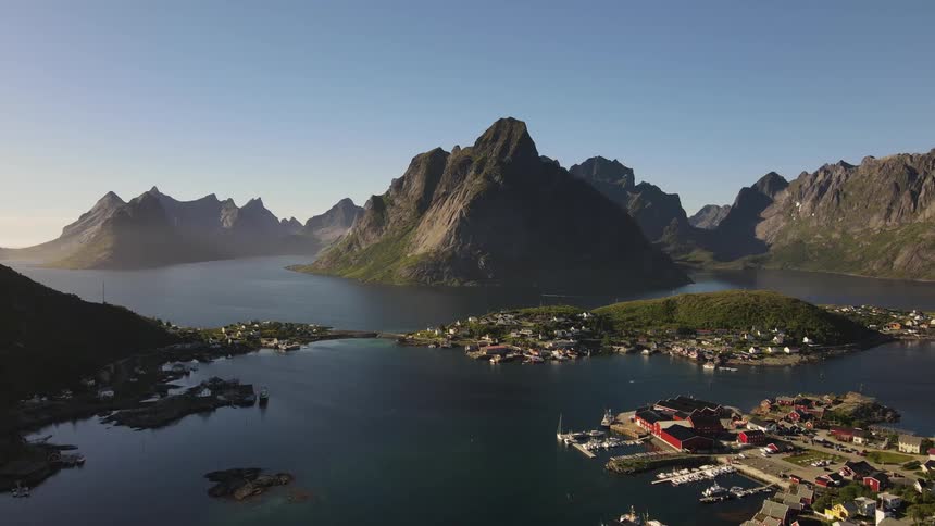 Aerial panorama of mountains and islands amidst the sea on a morning