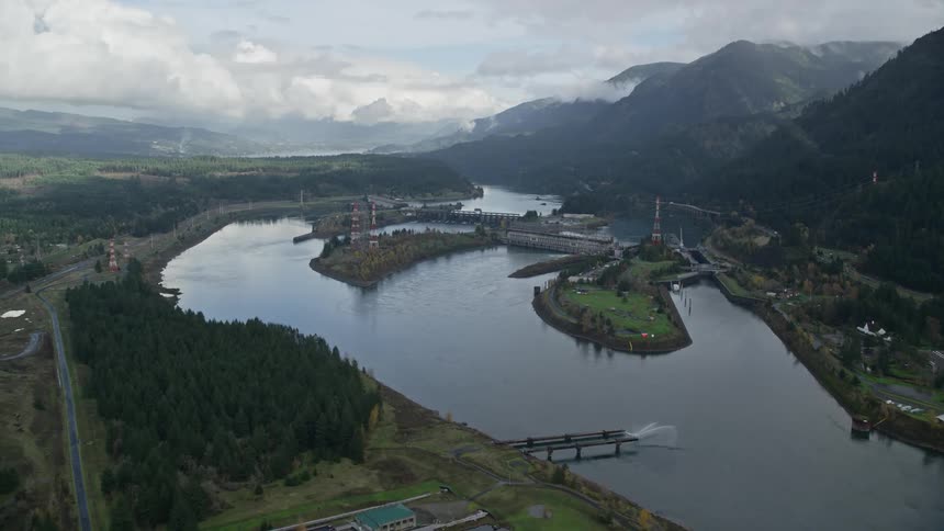 Aerial view of gates on a river in the mountains