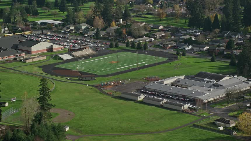 Overhead of sports fields next to a residential neighborhood