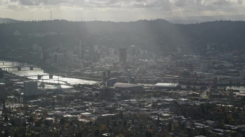 Aerial view of buildings and a river in the city
