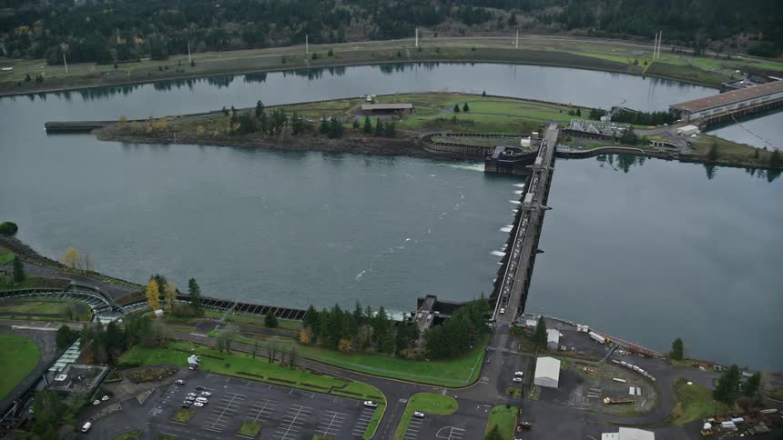 Aerial view of dam gates on a river