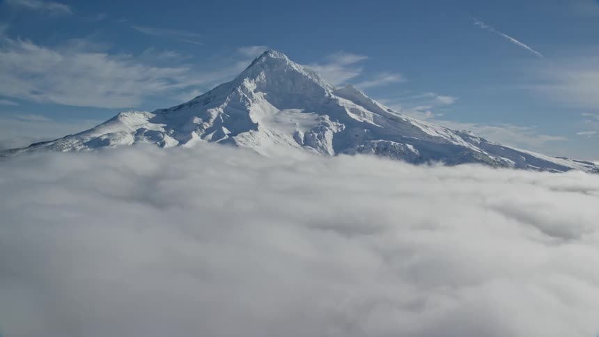 Aerial view of high snow capped mountain