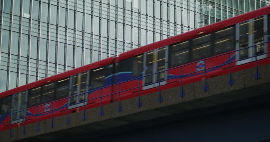 The train passes by the building