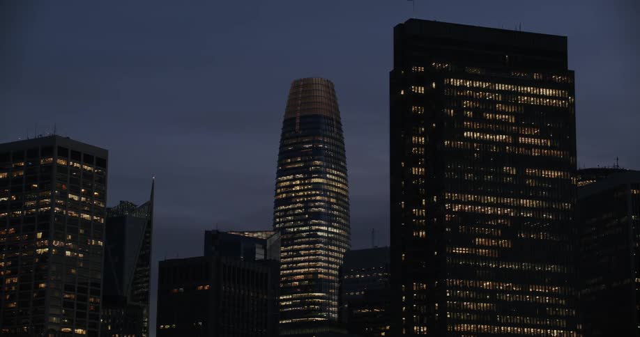 View of the external architecture of modern skyscrapers in a metropolis at night