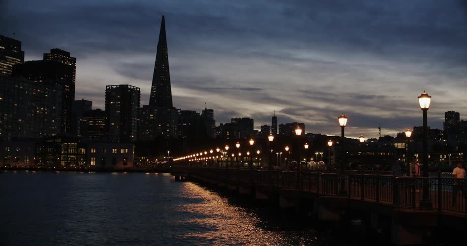 Skyline of san francisco seen from embarcadero at sunset