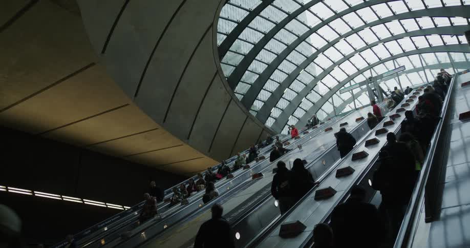 People are riding the escalator