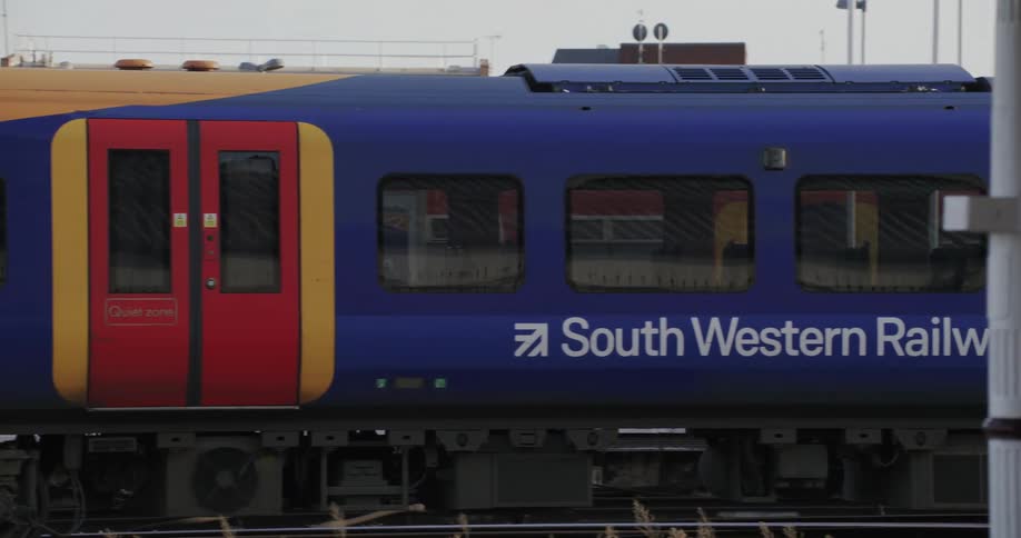 Colorful train arrives to the station