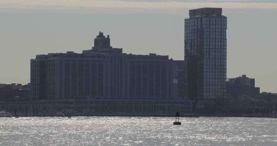 Buildings of a large city facing the sea