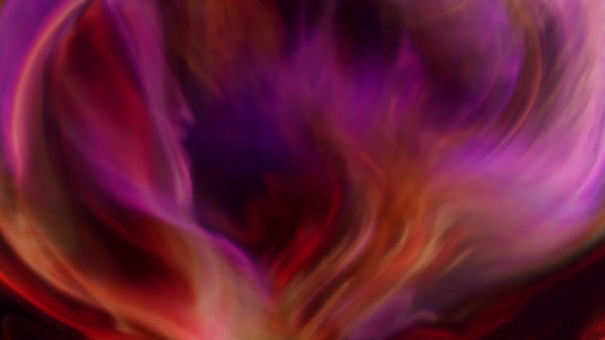 Red and purple layers flow and spread through mixture