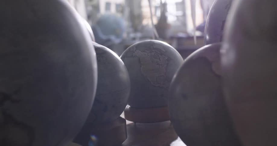 Close up of earth globes inside a workshop