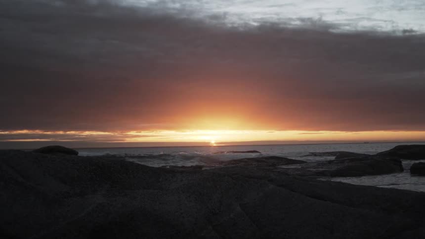 The sun rises at the beach