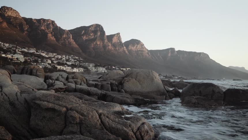 Waves crash on a stony shore