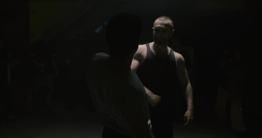 A man punches another man