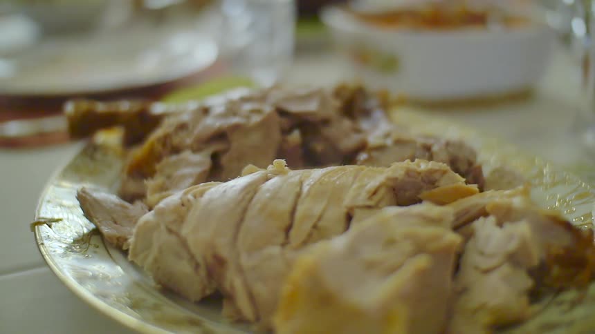 A plate of food sits on a table