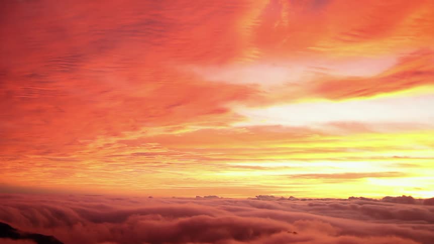 Orange and gold clouds at sunset