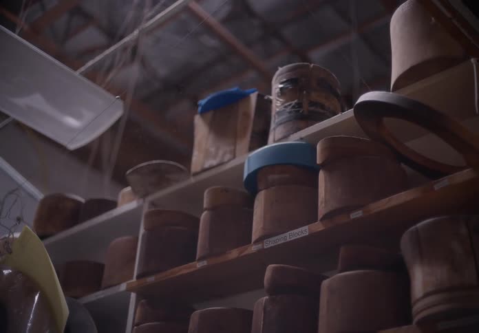 Vases on a shelf in a closet in the shed