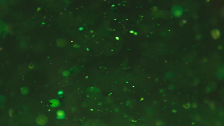 Green glow fluid art underwater