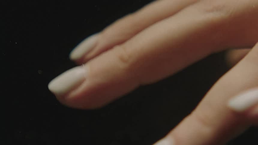 Extreme closeup of a womans fingers