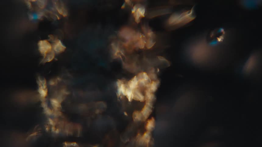 Two abstract objects are on fire and rotating rapidly