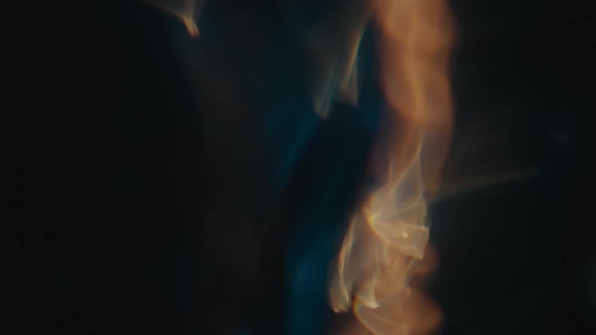 Close up of fire contained inside swirling clear water