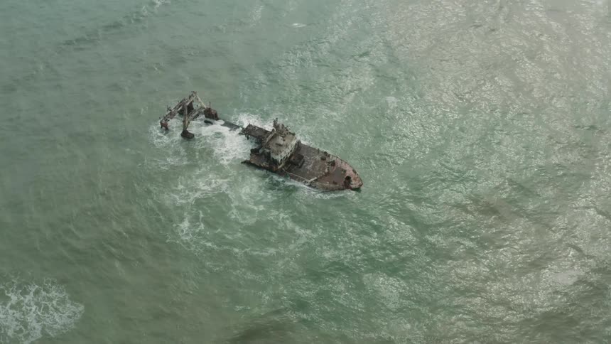 Aerial view of a grounded shipwreck
