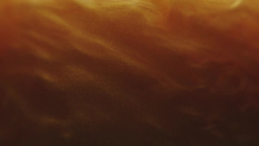 Abstract amber liquid movement