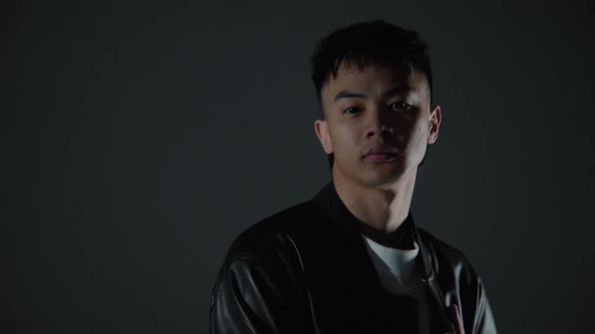Young man models a leather jacket