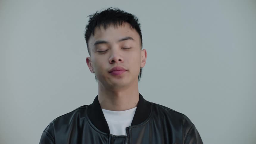 Close up of the face of a young asian man