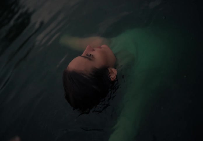 Woman dancing in the water