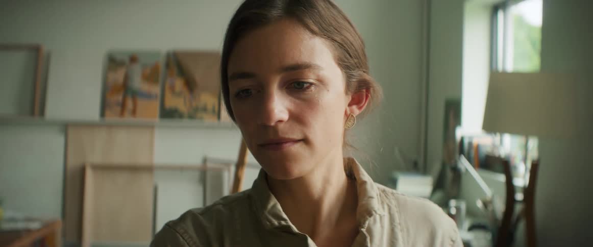 Close up of the face of an artist painting